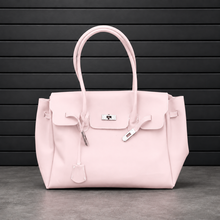 Sac à main Jelly Firkin Baby Pink en PVC effet gelée rose tendre, fermoir cadenas argenté et anses rondes surpiquées