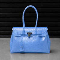 Sac à main Jelly Croco Azure en TPU premium gaufré effet crocodile bleu azur, finition satinée et fermoir cadenas