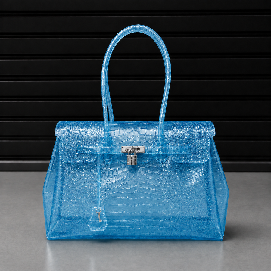 Sac à main Jelly Croco Glossy Ocean en PVC acrylique verni effet crocodile bleu océan, fermoir cadenas argenté