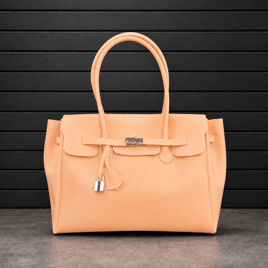 Sac à main Jelly Firkin Peach en PVC effet gelée orange pêche, fermoir cadenas argenté et anses rondes surpiquées
