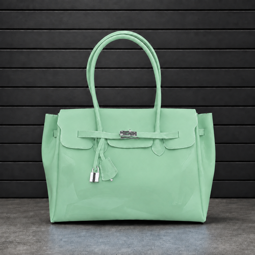 Sac à main Jelly Firkin Pistachio en PVC effet gelée vert pistache, fermoir cadenas argenté et anses rondes surpiquées