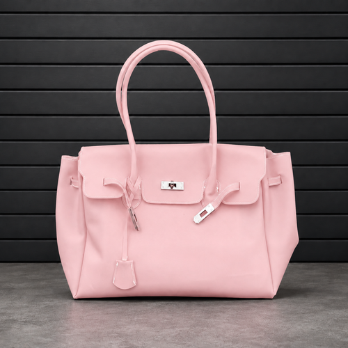 Sac à main Jelly Firkin Blush en PVC effet gelée rose poudré, fermoir cadenas argenté et anses rondes surpiquées
