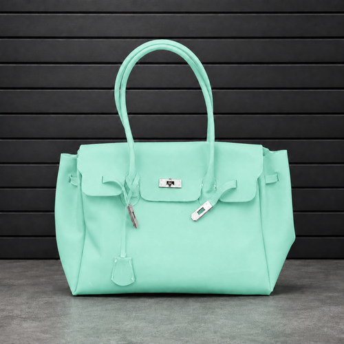 Sac à main Jelly Firkin Mint en PVC effet gelée vert menthe, fermoir cadenas argenté et anses rondes surpiquées