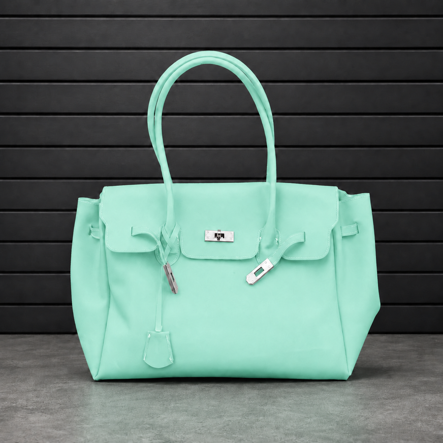 Sac à main Jelly Firkin Mint en PVC effet gelée vert menthe, fermoir cadenas argenté et anses rondes surpiquées