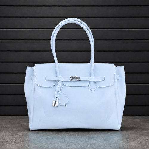 Sac à main Jelly Firkin Baby Blue en PVC effet gelée bleu layette, fermoir cadenas argenté et anses rondes surpiquées