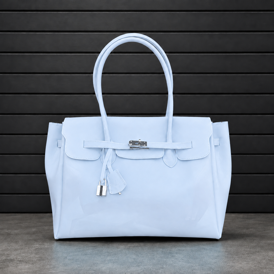 Sac à main Jelly Firkin Baby Blue en PVC effet gelée bleu layette, fermoir cadenas argenté et anses rondes surpiquées