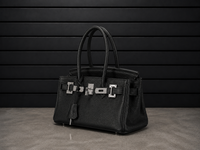 Sac Elan Bag Ébène vu de trois quarts, cuir véritable grainé noir ébène et ferrure argentée