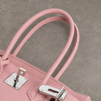 Anses et ferrure argentée du sac Elan Bag Pétale vues du dessus, cuir véritable grainé